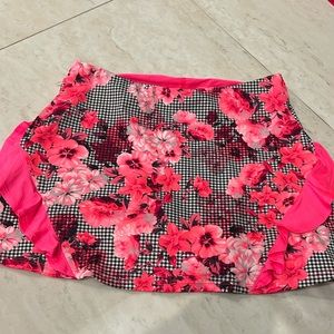 Tail pink and black tennis skirt